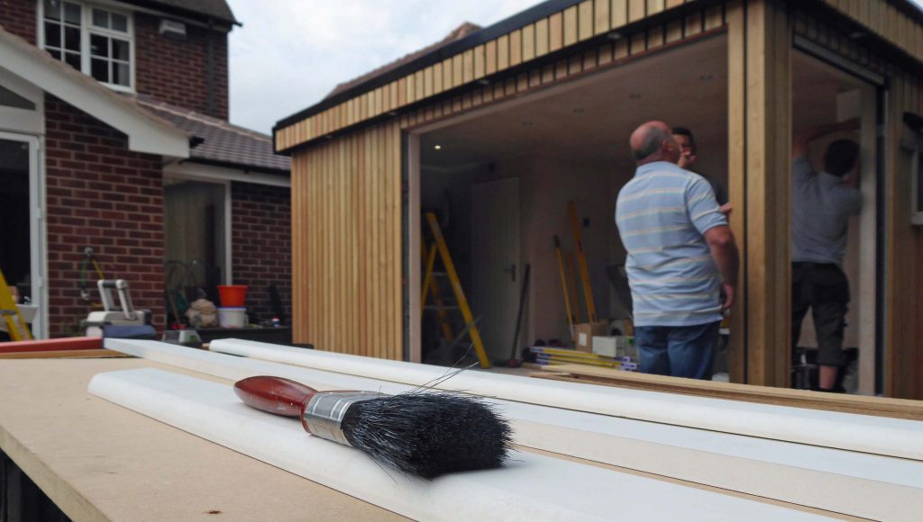 Garden room being constructed under the watchful eye of Swift Director